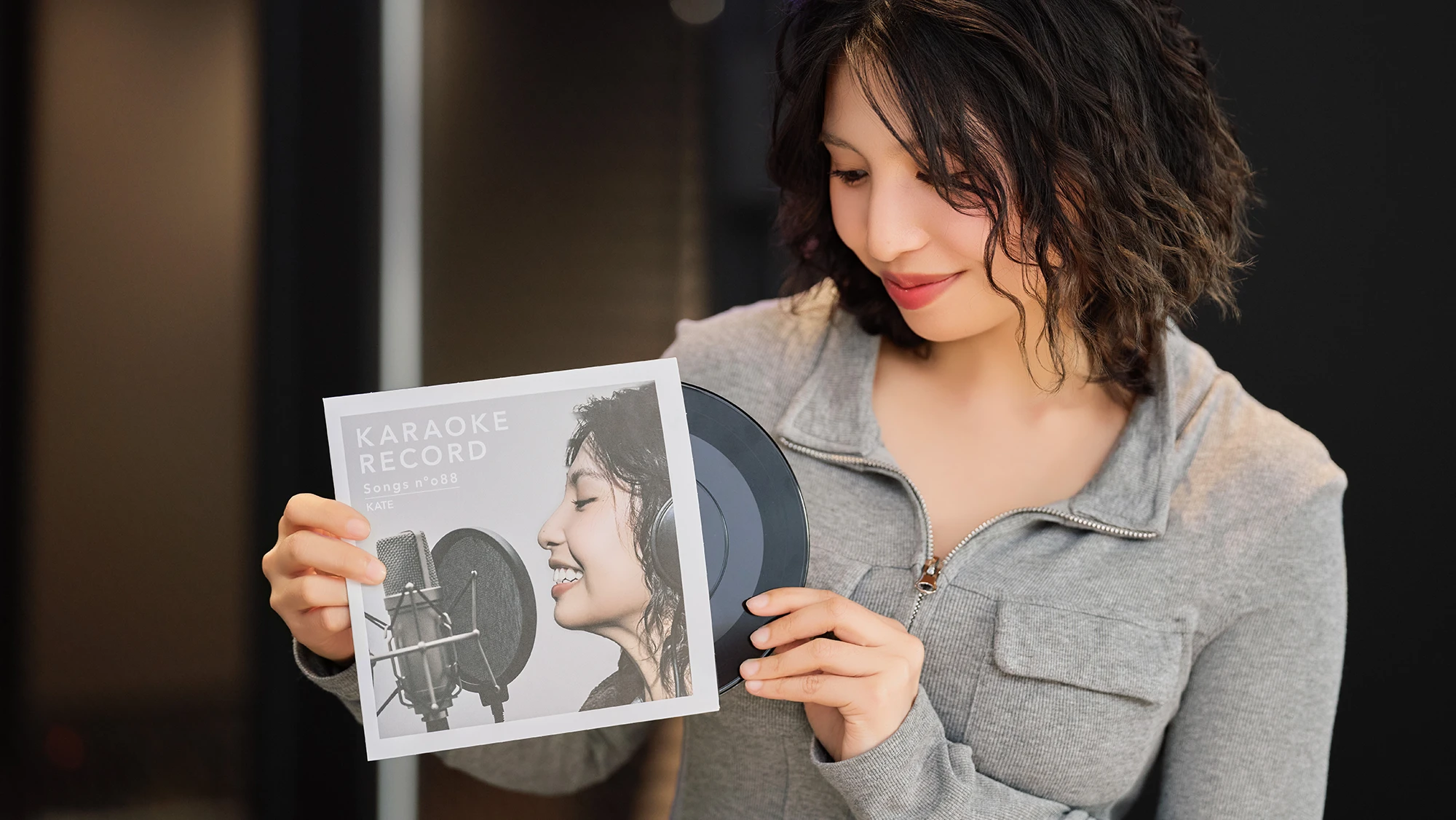 A finished karaoke record with a black and white printed sleeve